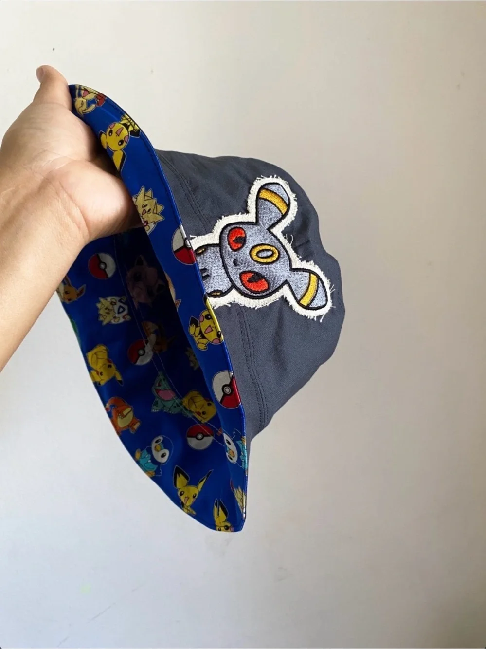 Hand Crafted Black Bucket Hat with Multi-Color Patch
